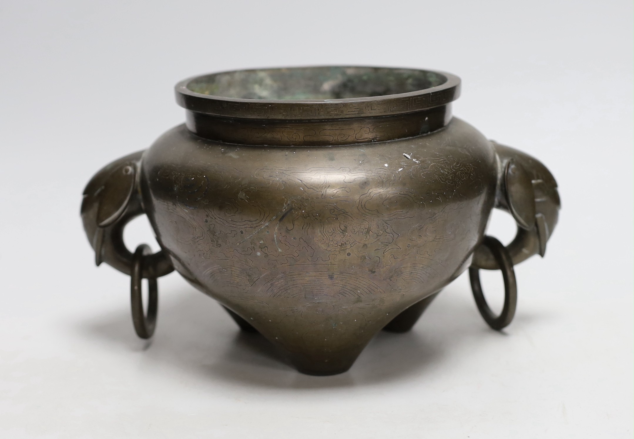 A large Chinese silver inlaid bronze elephant handled censer, signed Sishou, 19th century, 16cms high, 29cm wide